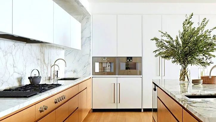 Vinyl kitchen wrapping applied to cabinets for a modern and budget-friendly makeover