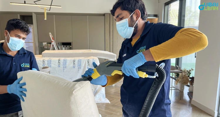 Professional sofa cleaning service removing stains and deep-set dirt from fabric upholstery.