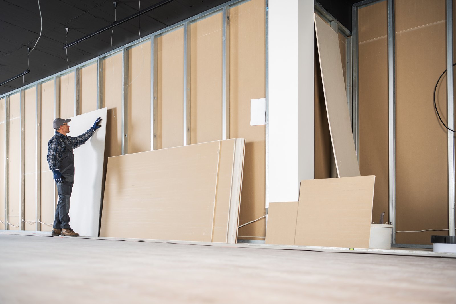 contractor selecting drywall panels 2025 03 13 22 41 53 utc