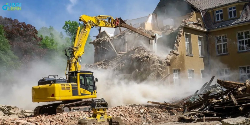 Excavator performing villa teardown as part of professional demolition services in Dubai