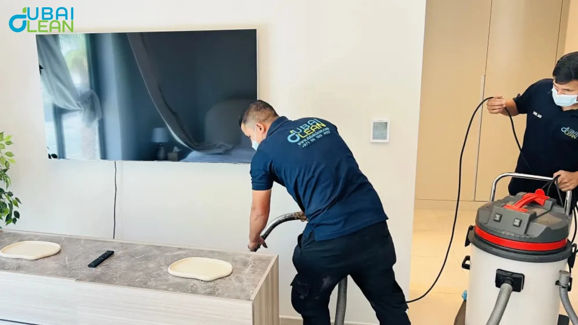 Villa deep cleaning crew restoring shine to floors and windows in an unfurnished space
